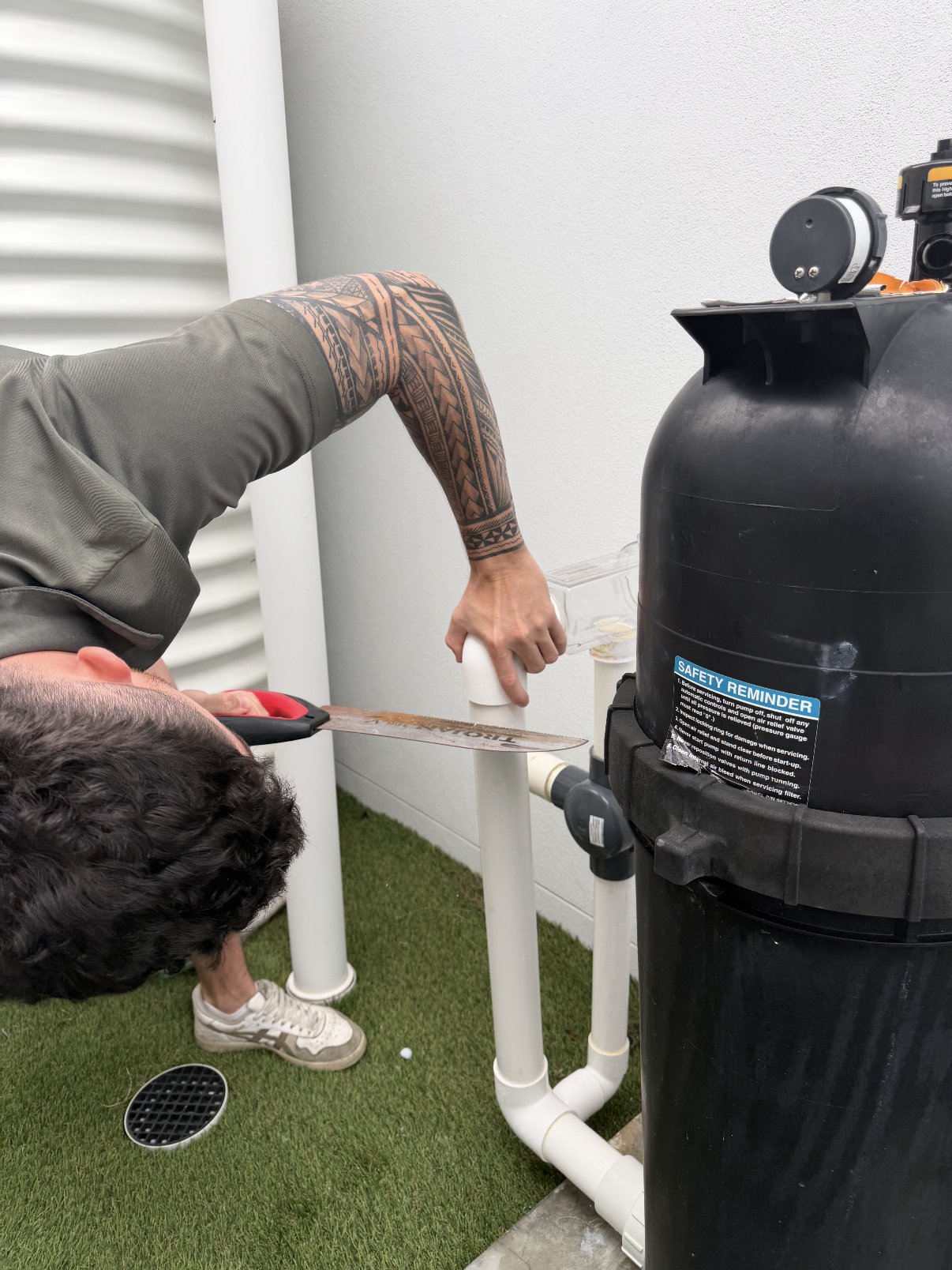 Jackson servicing a pool filter and pump setup on the Gold Coast