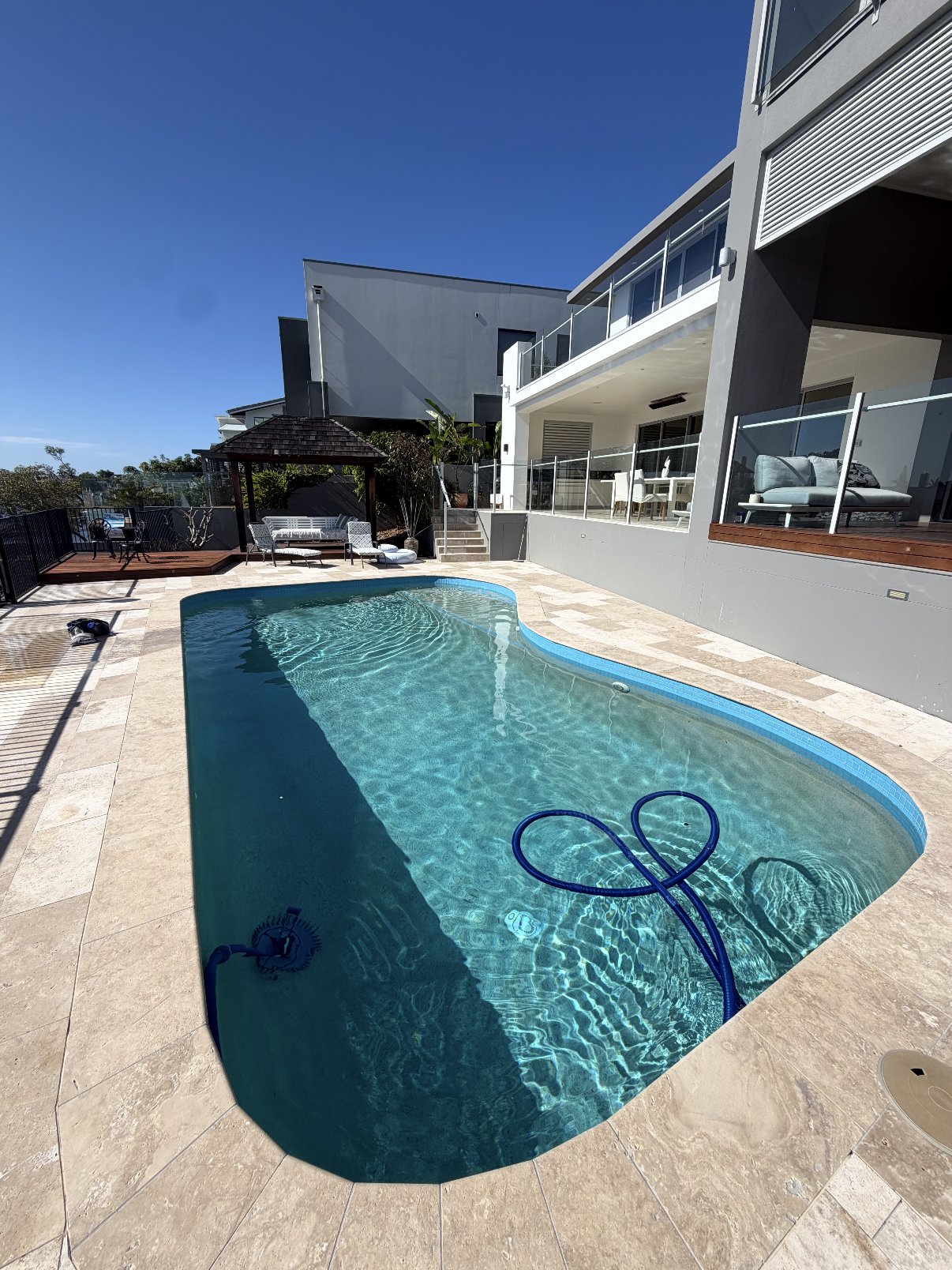 Robotic pool cleaner at work in a Gold Coast pool